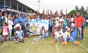 Mackenzie High School in celebration mode Friday evening after dethroning CWSS to reclaim the schools’ athletics ‘Champion of Champions’ trophy at the Mackenzie Sports Club Ground in Linden.