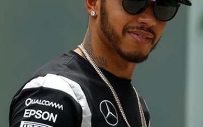 Hamilton storms to pole in Malaysia