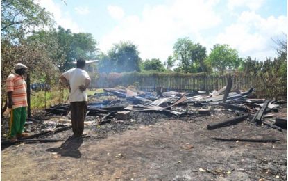 Woman held for Golden Fleece fire