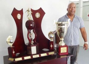 Our ‘Special Person’ stands besides some of the awards, trophies that were presented to students following their participation in various sports.