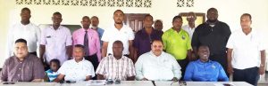 Officials of the GCB and GCUC (seated) with some of the participants at the opening session on Friday morning. 