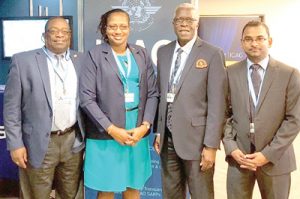From left Lt. Col. Rtd. Lawrence London; Minister Annette Ferguson; Lt. Col. Egbert Field; and Mr. Saheed Sulaman, Director, Air Transport Management