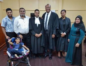  From right, Arif Hosein-Shah (brother), Magriff (father), Asif Hosein-Shah, Justice Sandra Kurtzious, Bibi Fazeela (mother) and his angel Zarah in front.