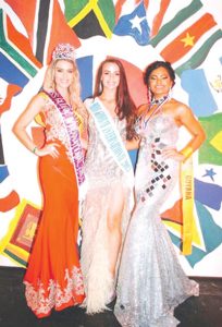 Miss Global International 2016 First Runner Up, Poonam Singh (right) poses for a picture with Miss Global International 2016 from Brazil, and Miss Global International 2015 