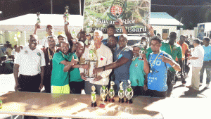 The victorious GRDB team with minister of Agriculture Noel Holder display their accolade 