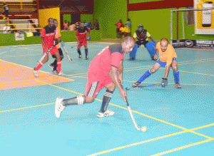 A player from Old Fort advances towards the Hickers goal area in their encounter on Tuesday at the National Gymnasium.
