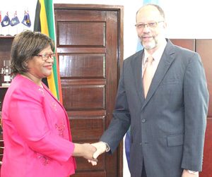 CARICOM Secretary-General Ambassador Irwin LaRocque (right) congratulates South Africa’s new High Commissioner, Her Excellency Xoliswa Ngwevela. (CARICOM Photo)