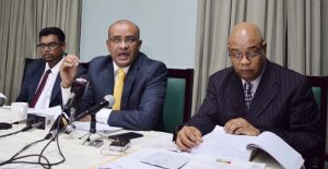 Leader of the Opposition, Bharrat Jagdeo (Centre) and Members of Parliament, Irfaan Ali (Left) and Juan Edghill during the press conference yesterday. 