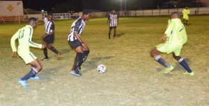 Action in the clash between Santos and Linden’s Botofago on Thursday night at the Tucville ground.