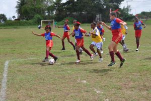 Action in the clash between St. Angela’s and F.E. Pollard yesterday.