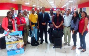 The Guyana delegation being met on arrival at the Jose Marti International Airport by Ambassador Halim Majeed (centre).