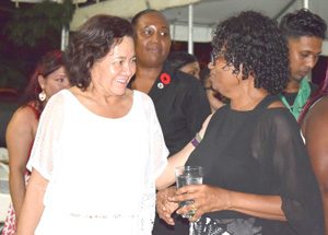 First Lady Sandra Granger chats with fashion designer Pat Coates.