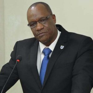 Minister of State,  Joseph Harmon