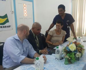 Officials at the launch of the Emergency Nursing Specialty Programme. Standing is Dr Zulfikar Bux and second from left is Minister George Norton in the company of specialists from the Vanderbilt Medical Centre. 