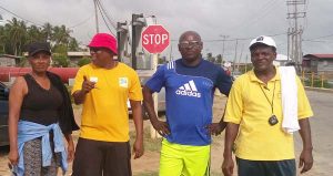 GBA President Steve Ninvalle (2nd left) flanked by from left, Ursula Paris (wife of Guyana’s lone Olympic Medalist MIchael Parris), TV Sport Personality Mark Young and Boxing Coach Gregory Cort before the 100-walk commenced in Berbice.