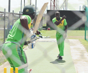 Rayon Griffith doing some batting drills with pacer Keon Joseph at Providence yesterday (Sean Devers photo)  