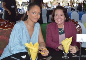 First Lady, Mrs. Sandra Granger, poses with pop star, Rihanna at Barbados’ Toast to the Nation event Wednesday to celebrate that island’s 50th anniversary celebrations.