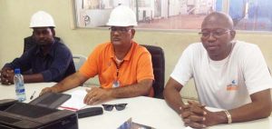 Gobin Harbhajan (c), a Member of the Board of Directors at the Skeldon Energy Inc, with other officials.