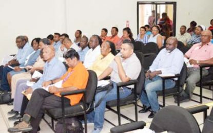 Policing liaison officers being trained in conflict resolution, anger management