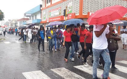 Hundreds brave rains for Youth Week Parade