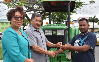 Sebai and Yarakita receive tractor trailer and implements