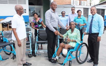 Food for the Poor distributes 1,000 wheelchairs