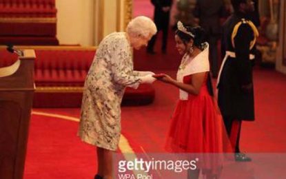 Enterprise girl visits Buckingham Palace, honored by Queen for community work