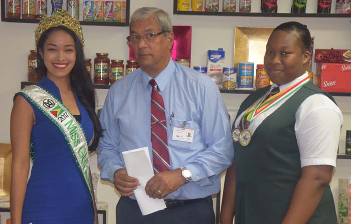 https://www.kaieteurnewsonline.com/images/2017/09/CEO-of-DeSinco-Trading-Frank-DeAbreu-is-flanked-by-Miss-Guyana-World-Vena-Mookram-left-and-IGG-gold-medalist-Jemiecia-Scott..jpg