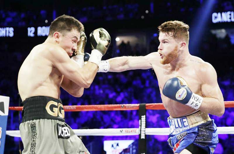 https://www.kaieteurnewsonline.com/images/2017/09/Canelo-Alvarez-right-throws-a-right-at-Gennady-Golovkin-during-their-fight-in-Las-Vegas-on-Saturday.-AP.jpg