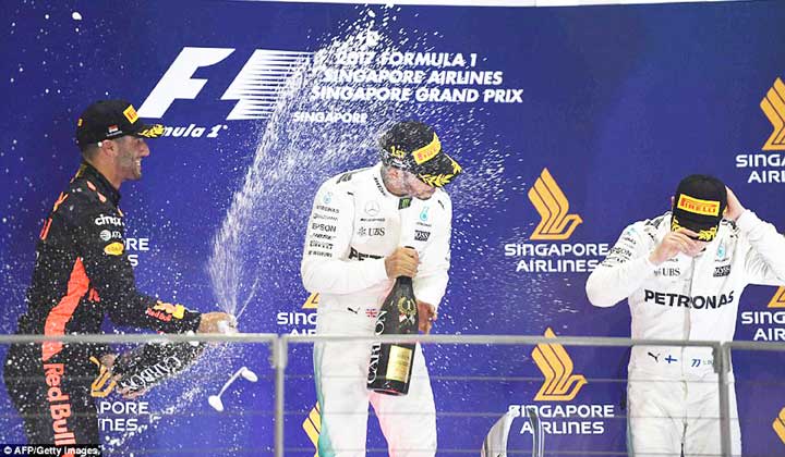 https://www.kaieteurnewsonline.com/images/2017/09/He-was-joined-on-the-podium-by-Daniel-Ricciardo-and-Valtteri.jpg