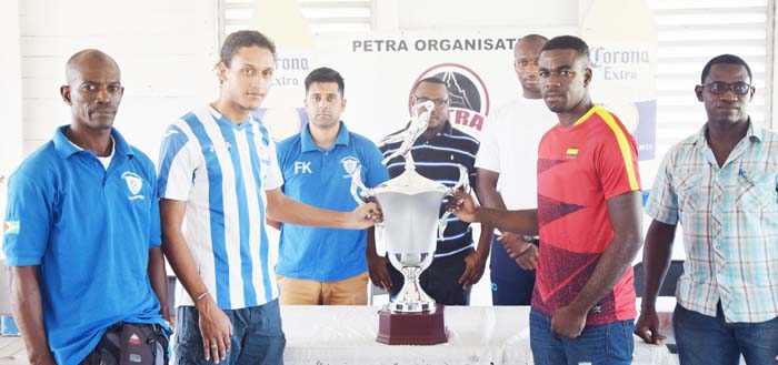 https://www.kaieteurnewsonline.com/images/2017/09/The-main-players-in-front-from-left-GFC-Coach-Floyd-Cadogan-and-Captain-Shaquille-Bowen-holding-the-Corona-Trophy-alongside-Police-Captain-Dwain-Jacobs-.jpg