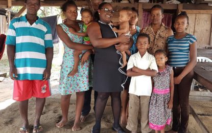 Minister Broomes visits Archibald family