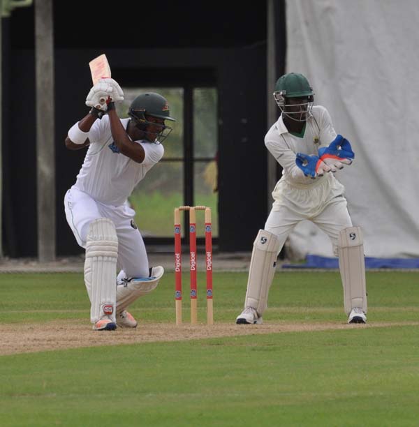 https://www.kaieteurnewsonline.com/images/2017/10/Leon-Johnson-cover-drives-for-four-during-his-31st-First-Class-fifty-at-Providence-yesterday.jpg