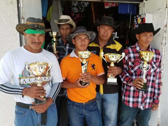 https://www.kaieteurnewsonline.com/images/2017/10/Some-of-the-Vaqueros-of-the-overseas-and-hinterland-posses-pose-with-some-of-the-trophies-up-for-grabs-today..jpg