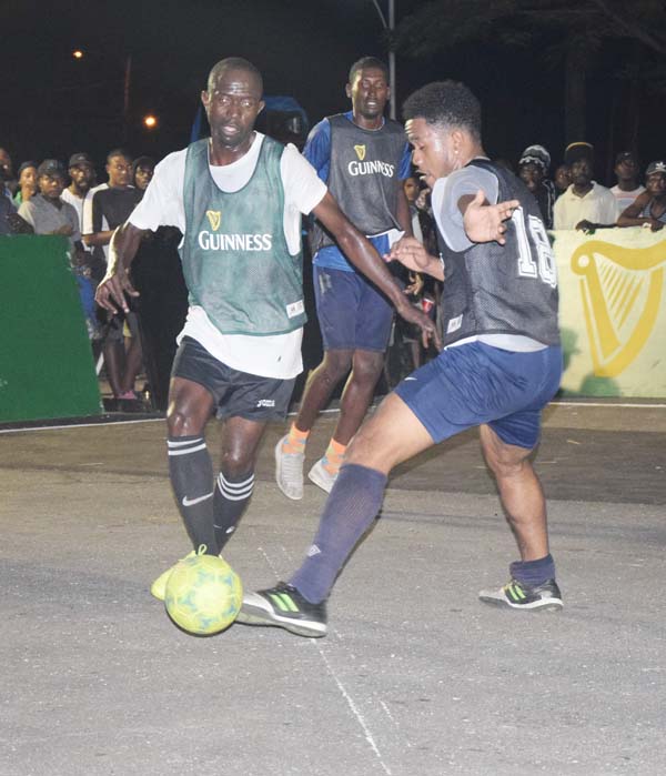 https://www.kaieteurnewsonline.com/images/2017/11/Gold-is-Moneys-Skipper-Phillip-Rowley-left-evades-a-Smyth-Street-player-during-his-teams-1-0-victory-copy.jpg