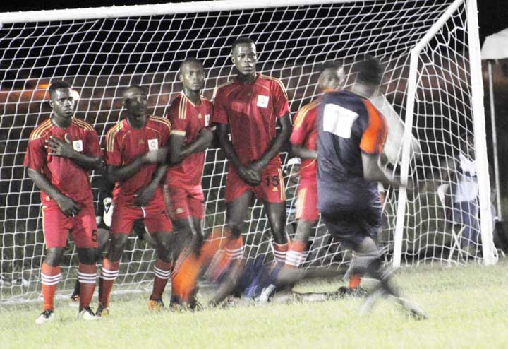 https://www.kaieteurnewsonline.com/images/2017/11/Mervin-Squires-goes-around-the-Wall-to-score-Grove-High-Tecs-consalation-goal-at-MOE-ground-on-Friday-night-Sean-Devers-photo.jpg