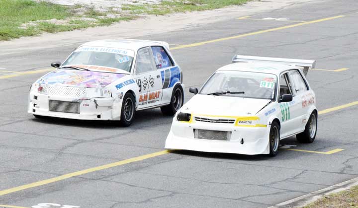 https://www.kaieteurnewsonline.com/images/2017/11/Rameez-Mohamed-left-about-to-overtake-Anand-Ramchand-in-race-2-of-the-Starlet-Cup-yesterday.jpg