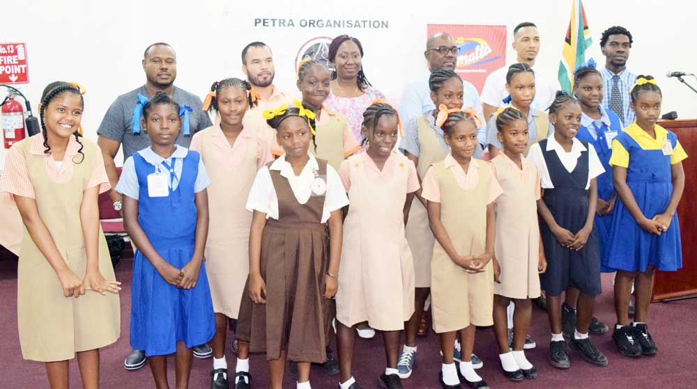 https://www.kaieteurnewsonline.com/images/2017/11/Reps-from-the-Sponsors-GFF-and-Petra-with-some-of-the-girls-that-will-be-battling-to-overthrow-2016-champions-St.-Angela%E2%80%99s-Primary.jpg