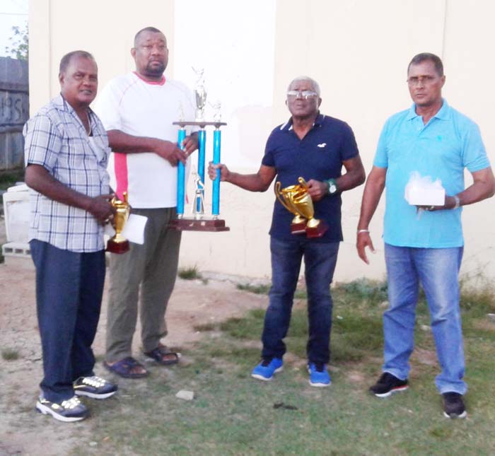 https://www.kaieteurnewsonline.com/images/2017/11/Rose-Hall-Town-Youth-Sports-Club-Secretary-CEO-Hilbert-Foster-hands-over.jpg