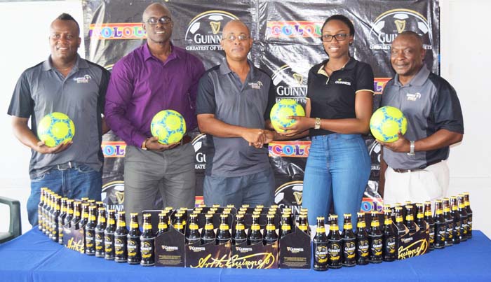 https://www.kaieteurnewsonline.com/images/2017/11/Three-Peat-Promotions-Rawle-Welch-3rd-from-left-collecting-the-symbolic-ball.jpg