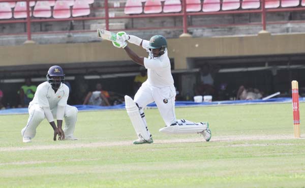 https://www.kaieteurnewsonline.com/images/2017/12/Chanderpaul-Hemraj-drives-glouriously-for-four-during-his-entertaining-79-at-Providence-yesterday-Sean-Devers-photo-copy.jpg