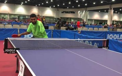 Gibrain Hussein Carrying Guyana flag in US table tennis Championships