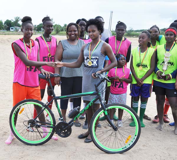 https://www.kaieteurnewsonline.com/images/2017/12/MVP-Lizzann-Lavroux-left-receives-her-cycle-from-EBFA-Assistant-SecretaryTreasurer-Abigale-Scott..jpg