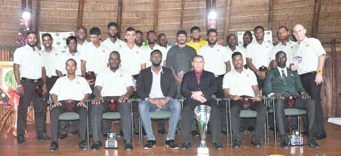 https://www.kaieteurnewsonline.com/images/2017/12/Sports-Minister-George-Norton-3rd-right-and-Director-of-Sports-3rd-left-with-the-three-time-defending-Champs-Guyana-Jaguars-Sean-Devers-photo-copy.jpg