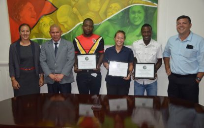 Guyana All-star trio in Pan American Hockey Cups presented with their certificates