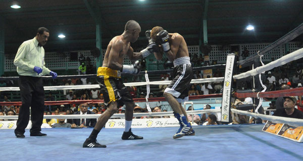 https://www.kaieteurnewsonline.com/images/2018/01/Guyanas-Dexter-Marques-catches-Dionis-Arias-with-a-wicked-left-to-win-his-Flyweight-encounter-by-a-unanimous-verdict-Sean-Devers-photo-1.jpg