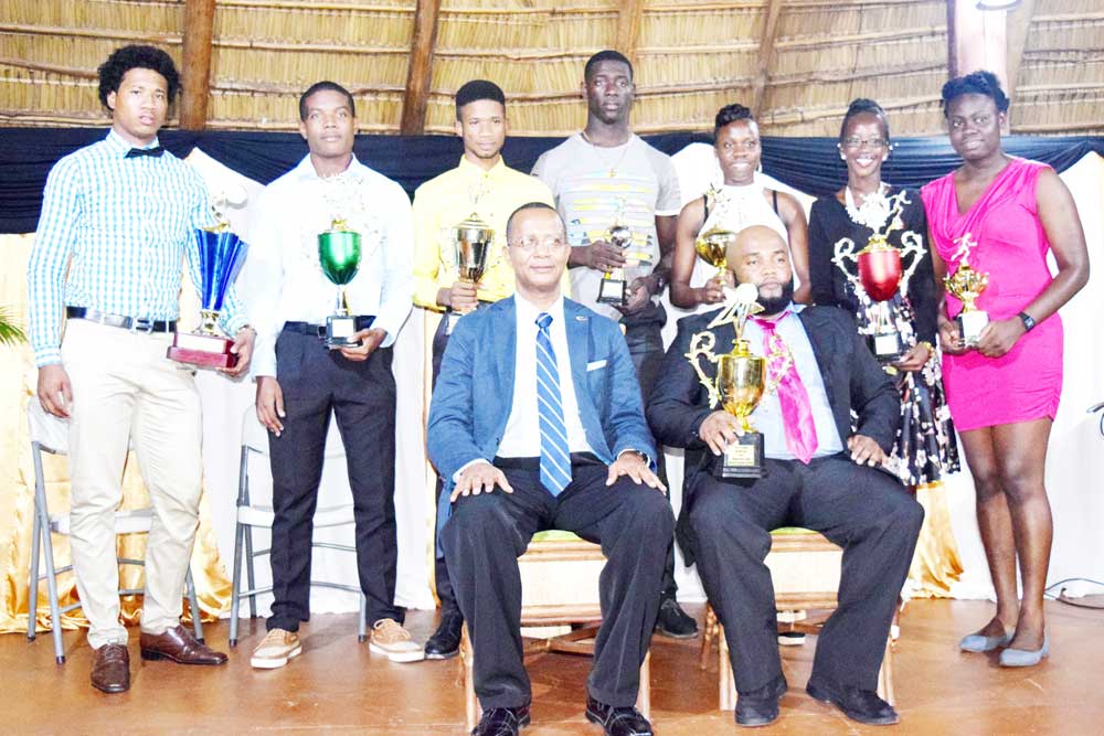 https://www.kaieteurnewsonline.com/images/2018/01/The-top-athletes-of-the-year-2017-pose-with-head-of-the-AAG-Aubrey-Hutson-and-Coach-of-the-year-Johnny-Gravesande-both-seated.jpg