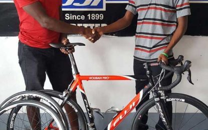 Former national cyclist donates new Fuji Carbon Fibre Road Bike to budding cyclist