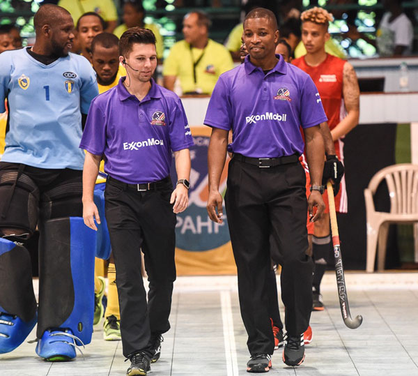 https://www.kaieteurnewsonline.com/images/2018/03/Umpire-Devin-Hooper-purple-shirt-on-right-at-the-2017-Pan-American-Indoor-Championships.jpg