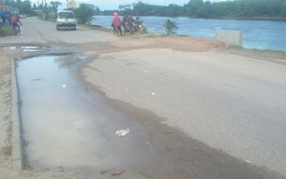 New koker, flooded street…Contractor asked to fix damaged Linden roadway that was dug up to lay pipes